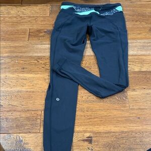 lululemon athletica Black Leggings with Teal Waistband and Patterned Trim